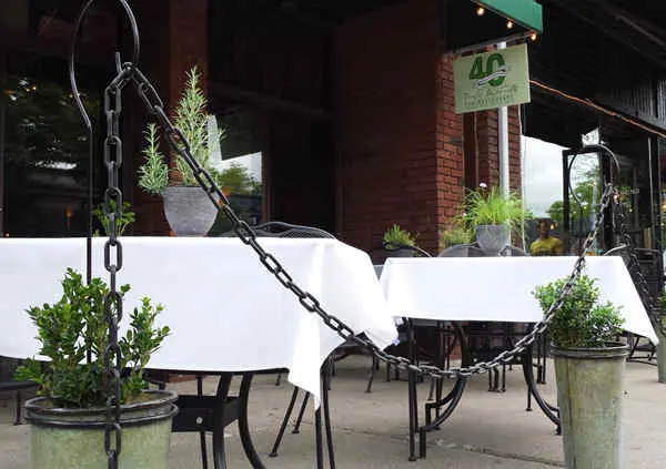 sidewalk-tables-with-chain-herbs
